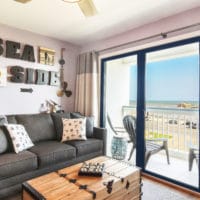 purple galveston condo beach view beachfront airbnb vacation rental